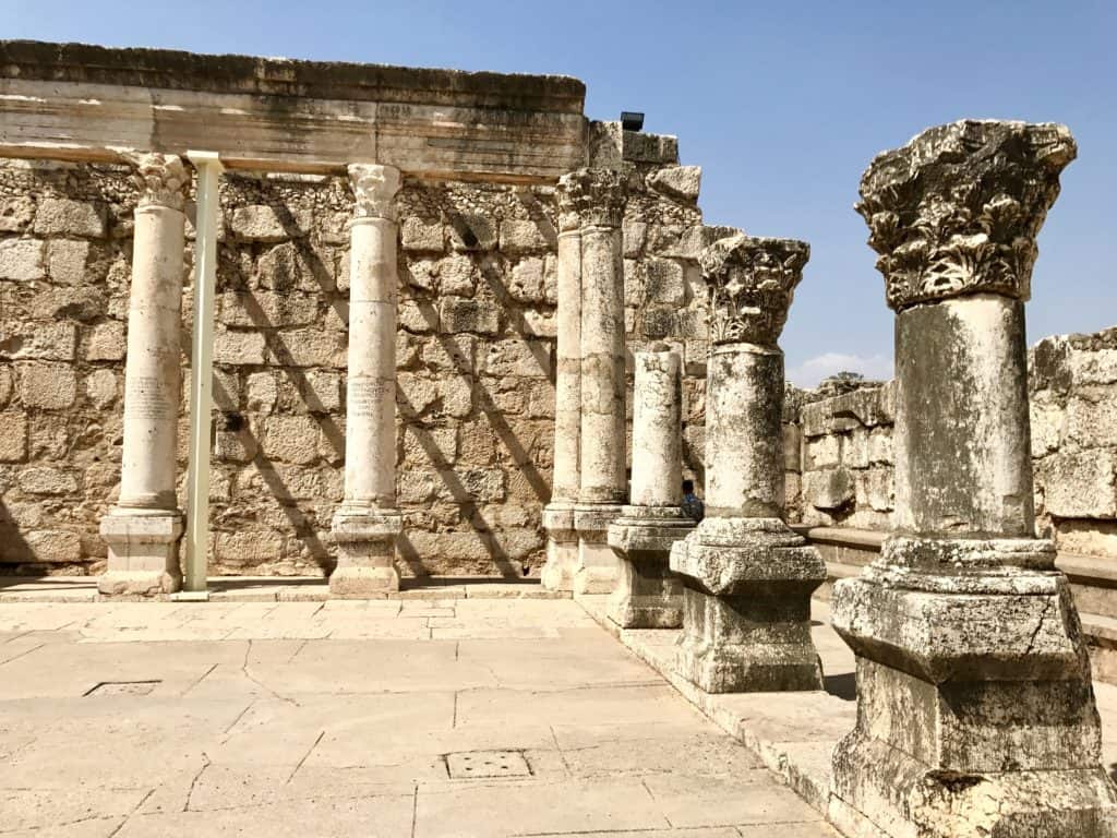 The white synagogue at Capernaum | A day trip from Tel Aviv to northern Israel, covering Caesarea, Tel-Megiddo, the Sea of Galilee, Capernaum, the Mount of Beatitudes, Tiberias, and Akko | what to do in Israel | There's so much to visit in such a small area, you can have a jam-packed day driving from Tel Aviv or Jerusalem but cover so many historic sites and towns | Israel itinerary ideas, Christian history trips, visit the Jesus trail, bible archaeology tours, what to see in Israel, Jerusalem day trips #israel #seaofgalilee #telaviv