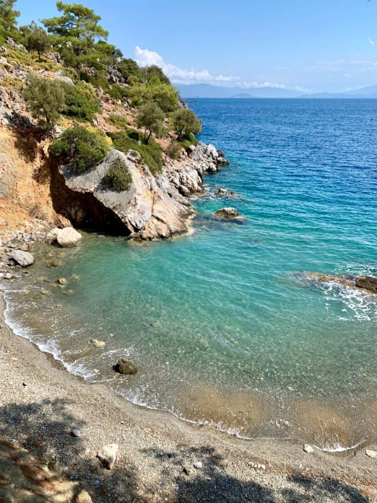 Hiking over to find the most amazing private beach - a great reason to sail in Turkey!