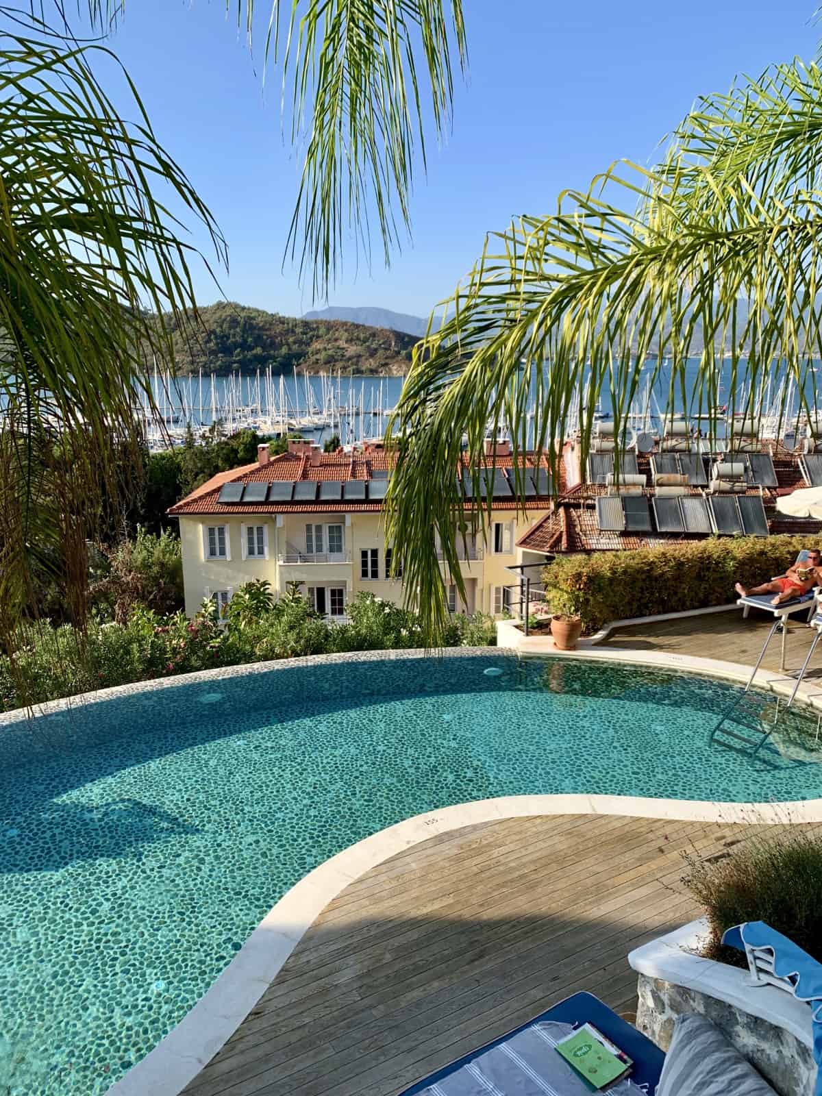 Staying at Hotel Unique in Fethiye, Turkey | A review of this beautiful hotel and all about my stay...I think this is one of the best hotels in Fethiye, with gorgeous rooms, balcony views, pool, wonderful staff, and more! A luxury yet affordable hotel. #fethiye #turkey #turquoisecoast #hotelreview #luxury