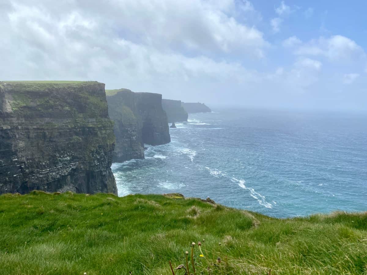 Should You Visit the Cliffs of Moher? Why they're skippable & where to go instead | I found Cliffs of Moher overtouristed & uninspiring. Best alternative to the Cliffs of Moher, how to visit the Cliffs of Moher, & where to go instead