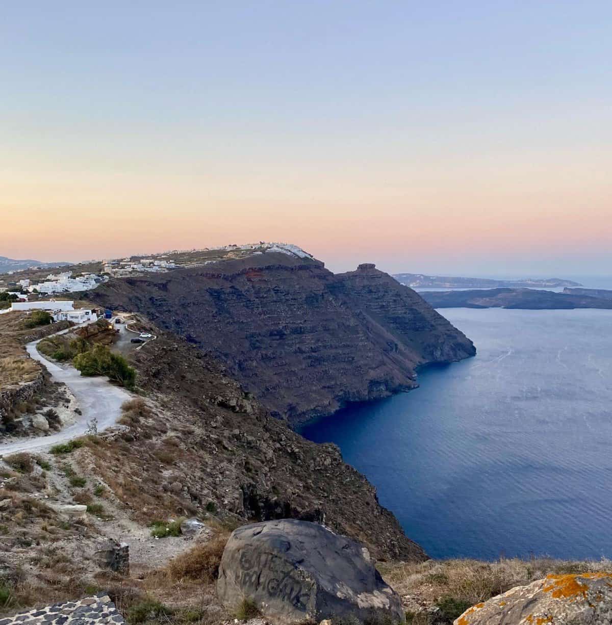 Santorini Hike at Sunrise: Imerovigli to Oia | Why you need to do the Fira to Oia hike in Santorini, where to begin, why sunrise is the best time, & a detailed guide to the famous Santorini hike. What to expect, tips, what to bring, & more! Santorini itinerary ideas, what to do in Santorini, what to do in Oia, Fira & more! Greece itinerary. #santorini #greece #hiking