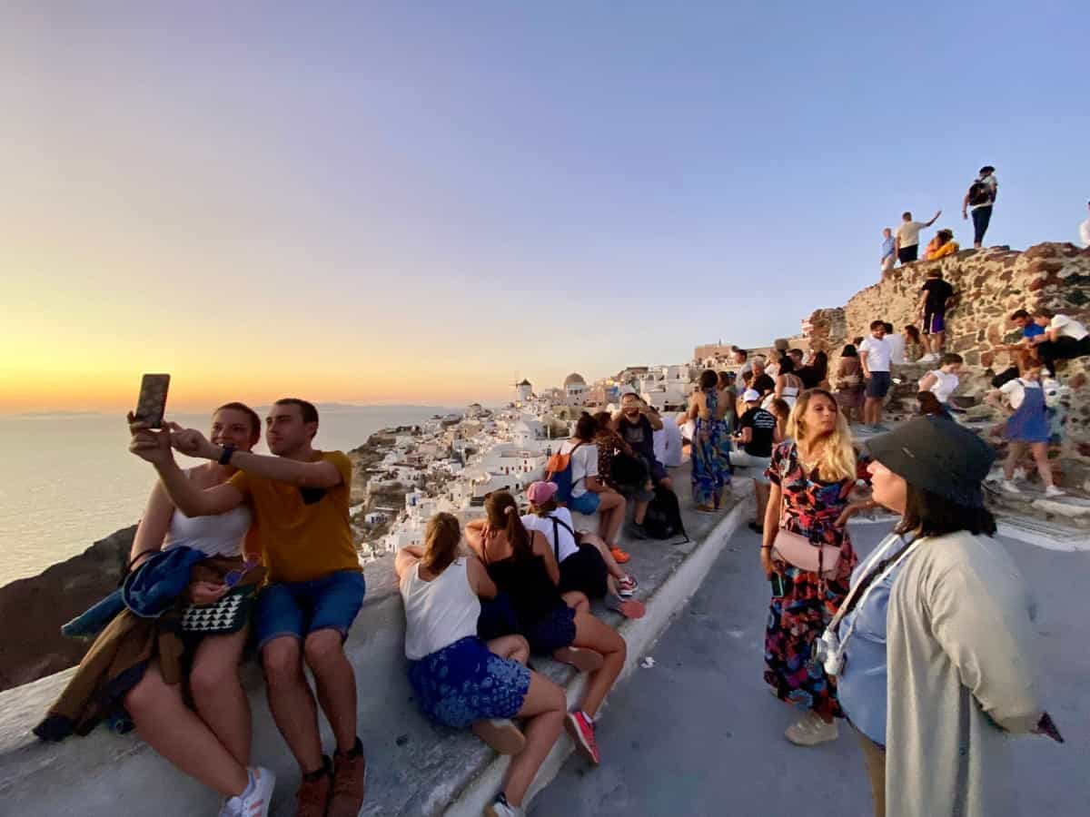 Things to do in Oia, Santorini - the end of sunset at Oia Castle