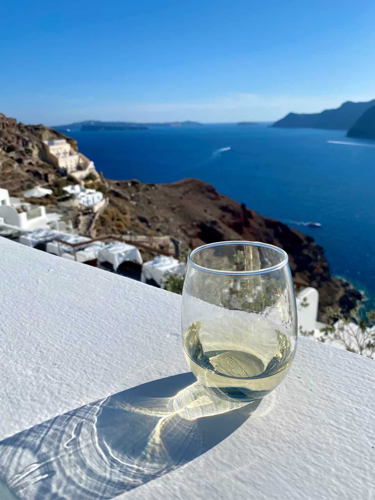 Things to do in Oia, Santorini | Is Oia worth visiting? A guide to Santorini's most famous town...what to do in Oia, where to eat, the best Oia cave hotels, helpful tips, & I share the awesome parts & the terrible touristy parts so you can decide if Oia deserves a spot on your Greek islands itinerary. #oia #santorini #greekislands 