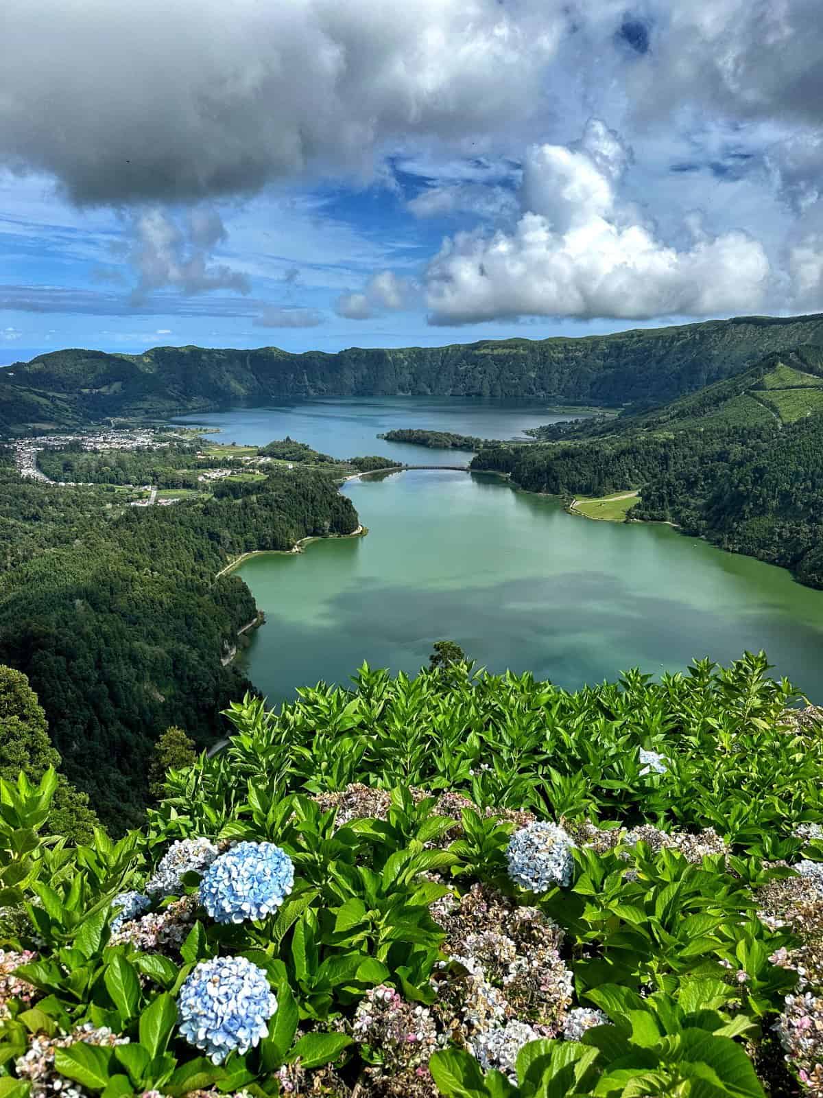 The vibrant blue & green crater lakes of Sao Miguel's Sete Cidades are an iconic Azores view - Miradouro Vista do Rei