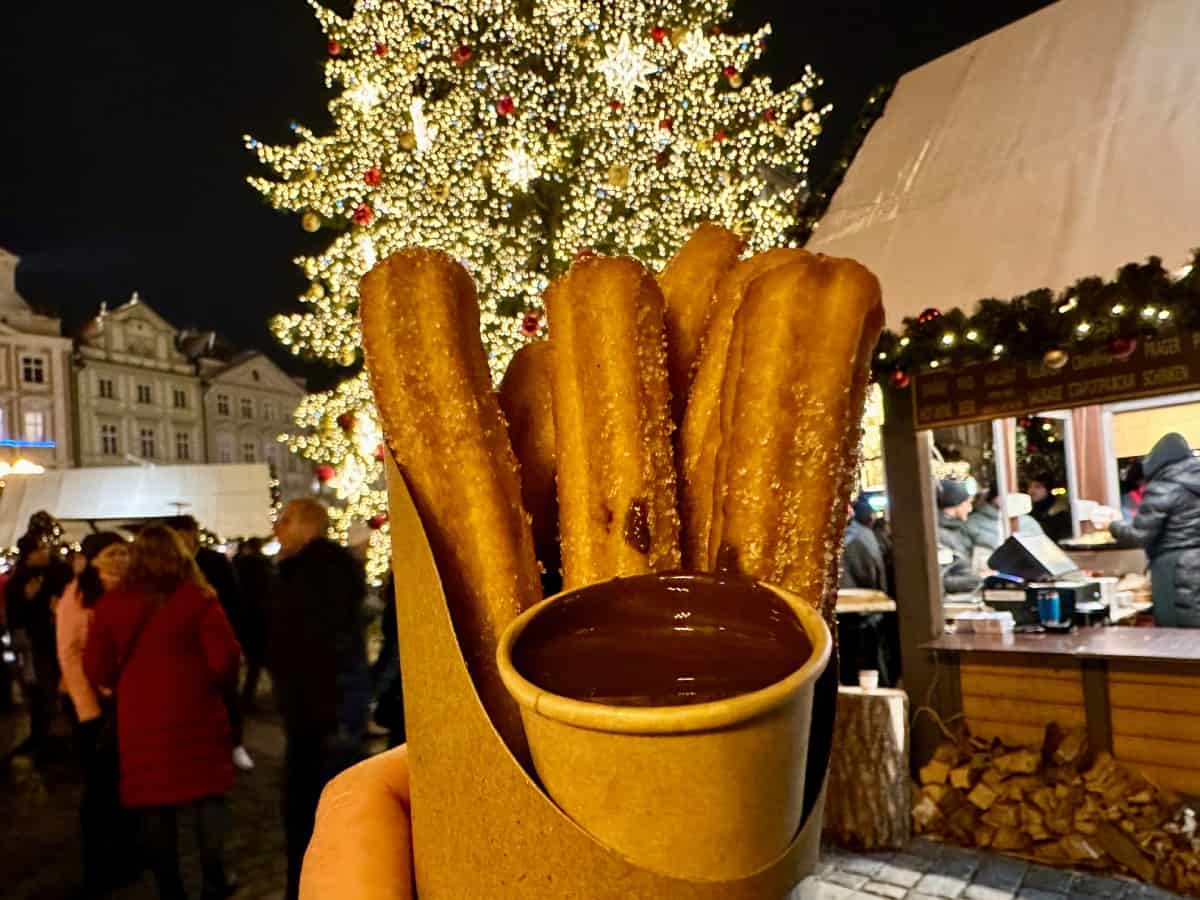 One of the best things to do in Prague in winter is visit the Christmas markets at night