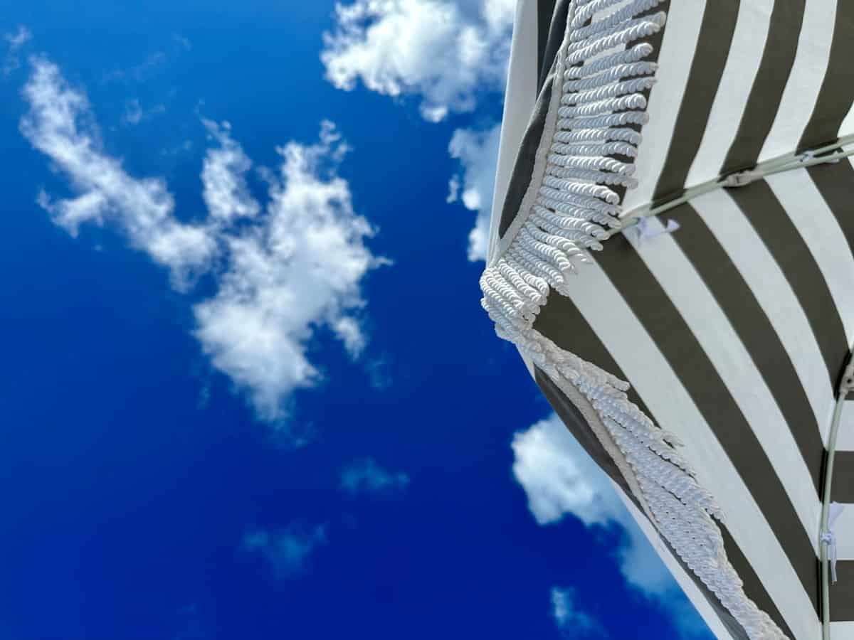 blue skies & a beach umbrella